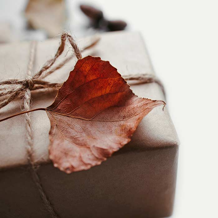Two personalized gift-wrapped products