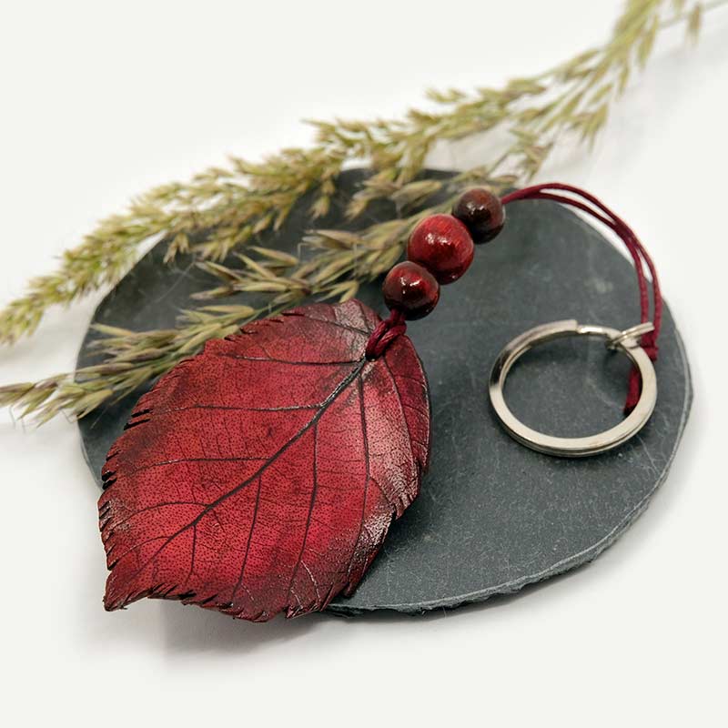 a dark red leather leaf