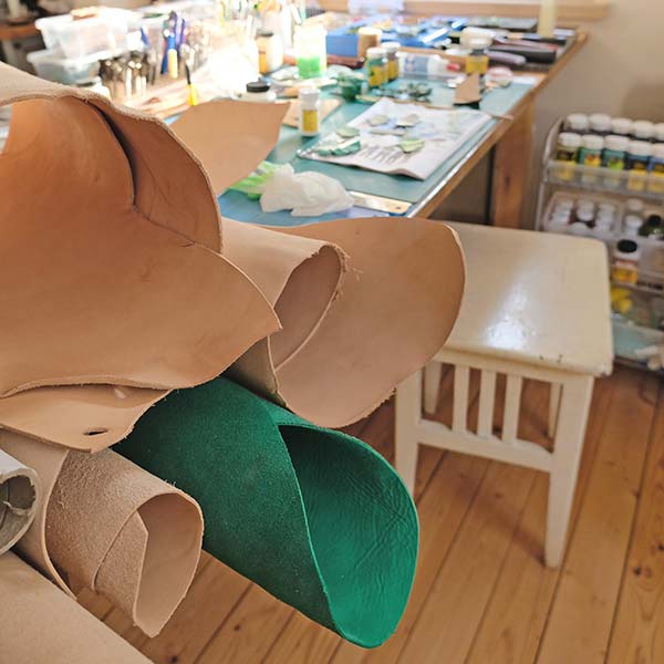 Rolled up leather on the workbench