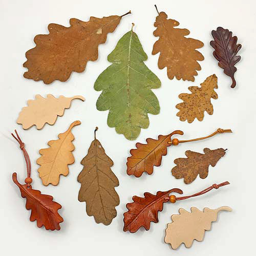 Real leaves alongside handcrafted leather leaves