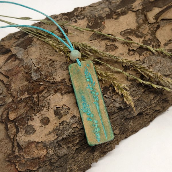 Preview: Turquoise and brown leather pendant with hand-tooled grass ears imprint
