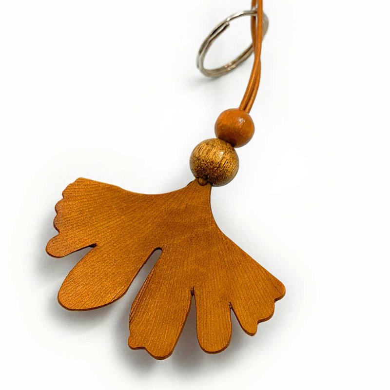 Ginkgo leaf in a reddish shade of amber