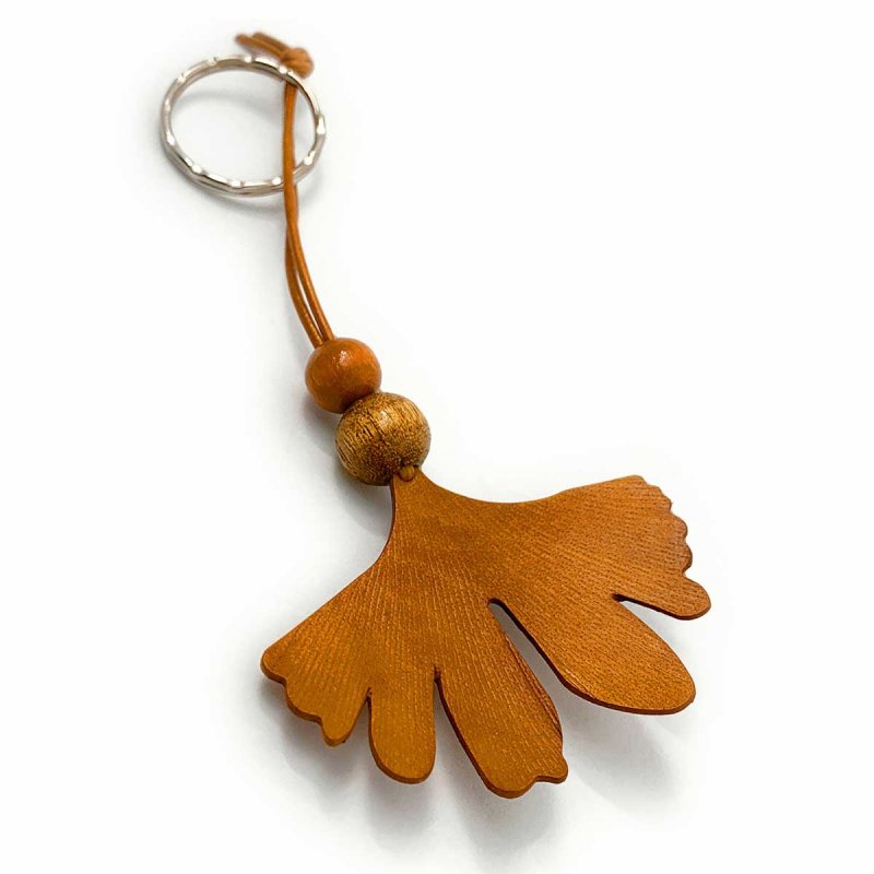 Ginkgo leaf in a reddish shade of amber