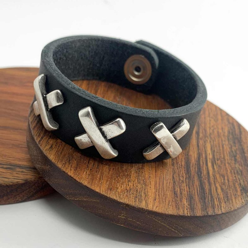 Slate black leather bracelet with diagonal cross-shaped rivets