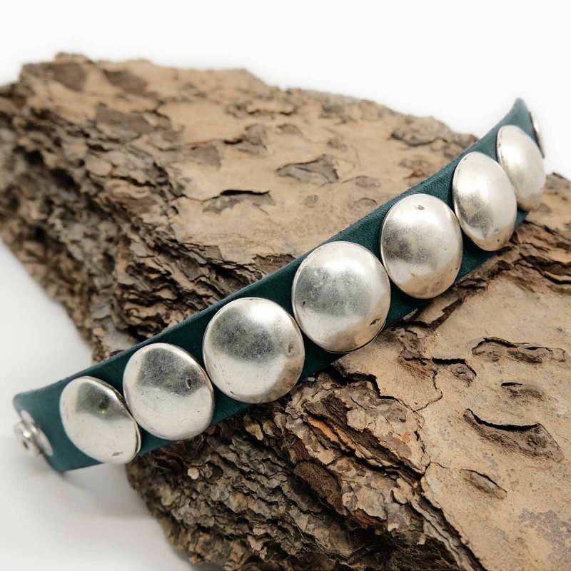 striking handmade leather bracelet in deep petrol green