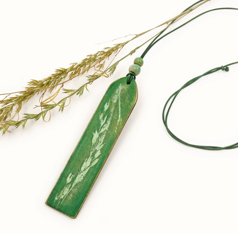 Nature-inspired leather necklace with handcrafted pendant