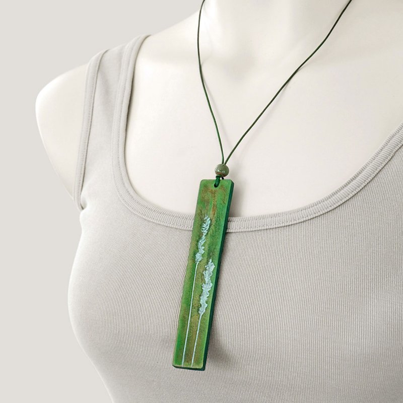 Handcrafted grasses pendant with leather cord